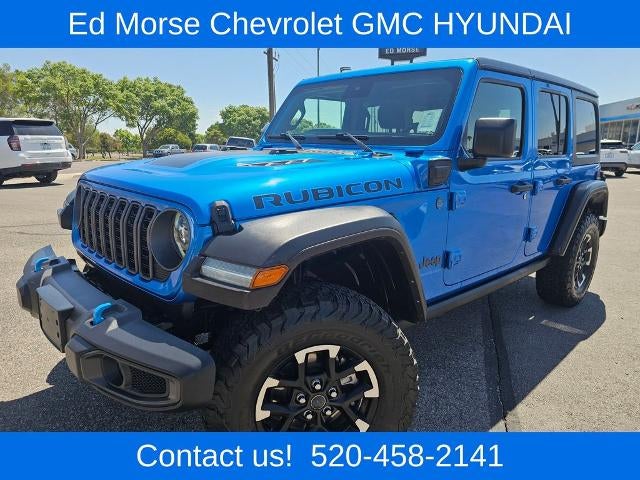 2024 Jeep Wrangler 4xe Rubicon 4x4 in Hydro Blue Pearl Coat — front three-quarter view