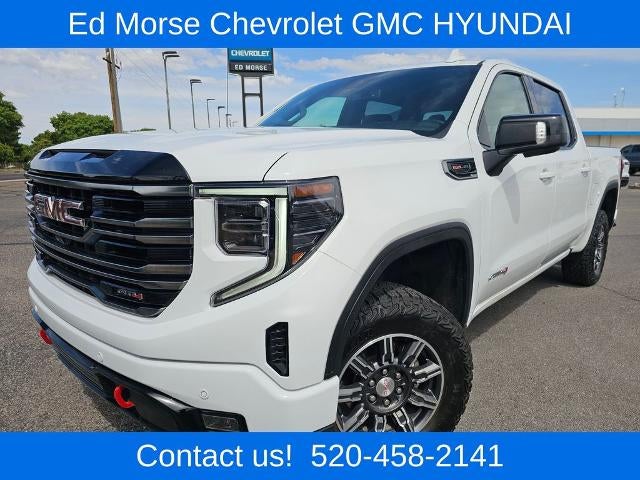 2025 GMC Sierra 1500 Crew Cab Short Box 4-Wheel Drive AT4 in Summit White — front three-quarter view