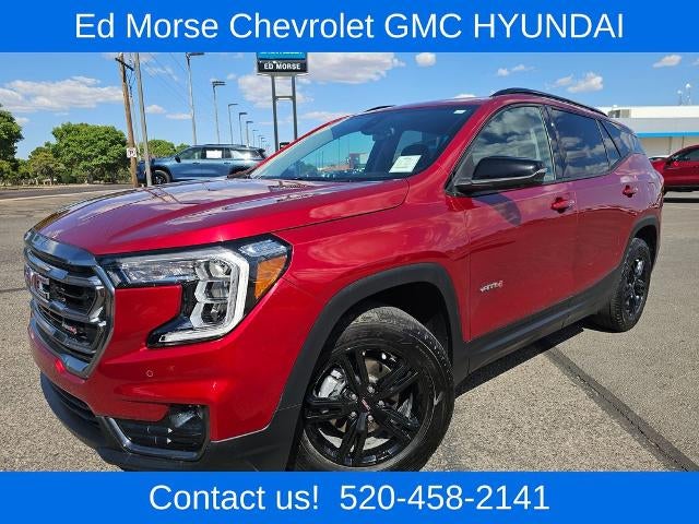 2024 GMC Terrain AWD 4dr AT4 in Volcanic Red Tintcoat — front three-quarter view
