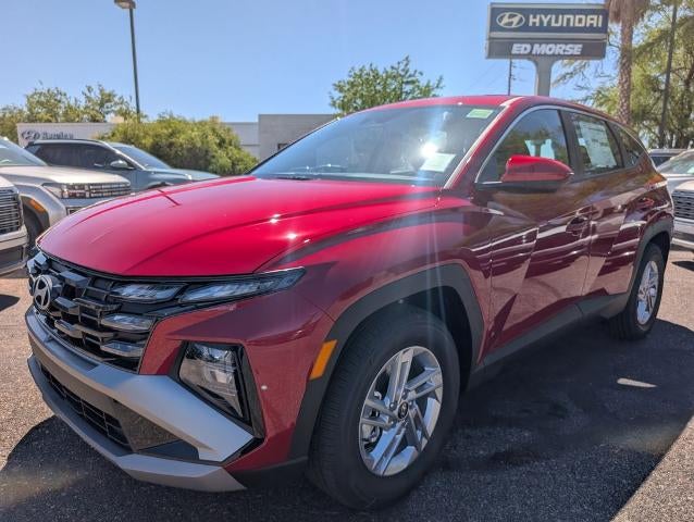2026 Hyundai TUCSON SE FWD in Ultimate Red — front three-quarter view